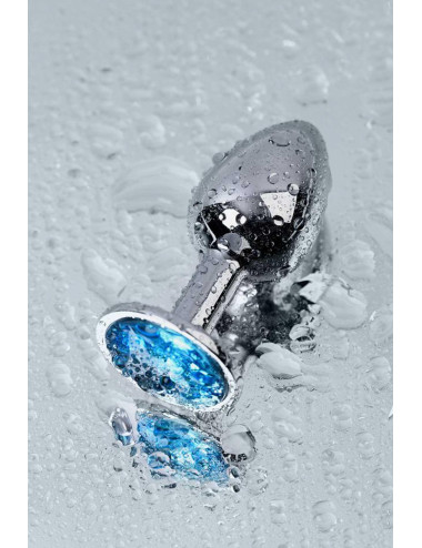 Silver anal plug TOYFA Metal,with a Topaz color gem
